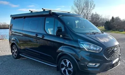 ((Dept 26) Ford Nugget + Noir . Van aménagé 5 places carte grise et 4 couchages